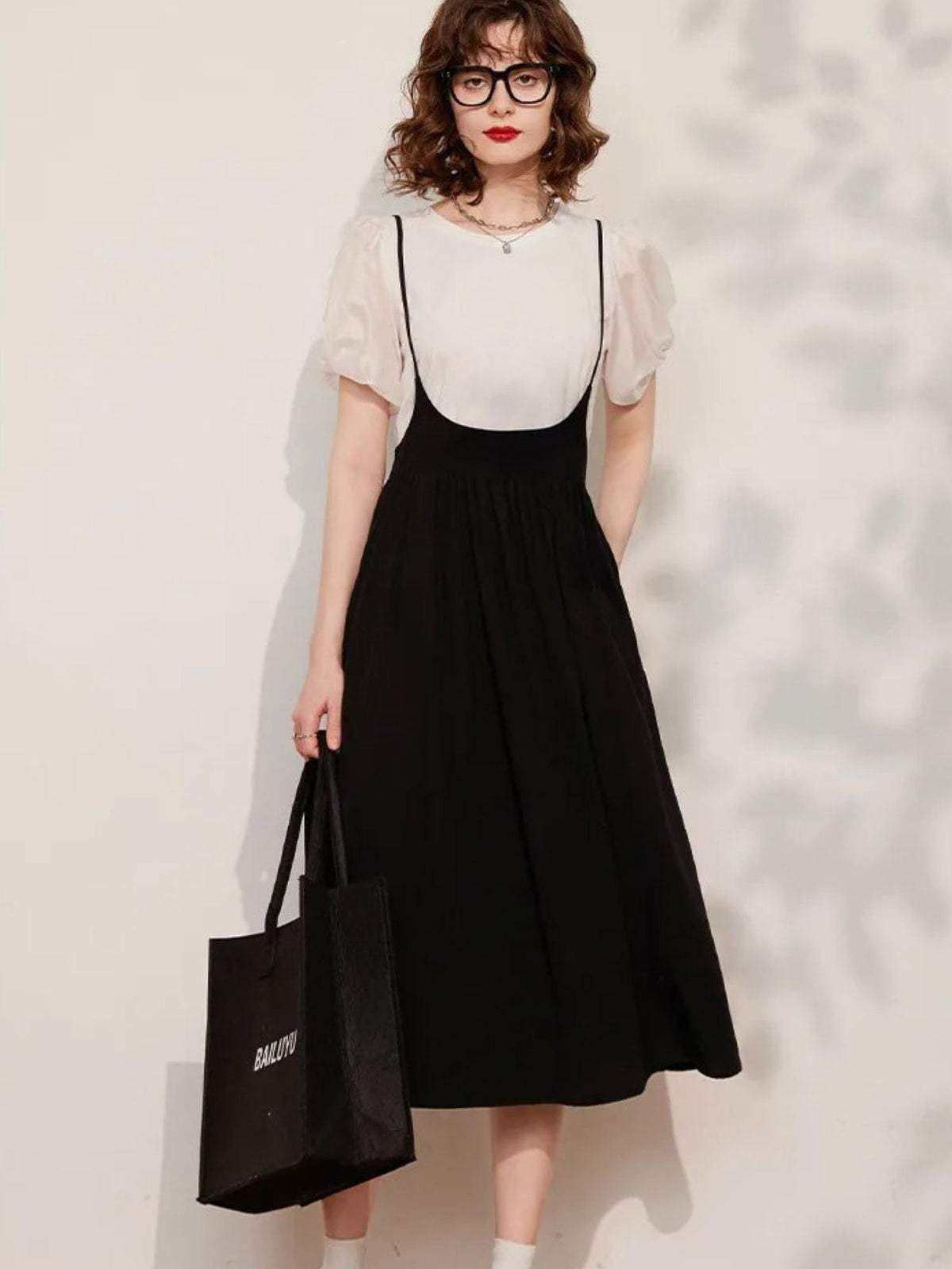 Conjunto de top con mangas abullonadas y falda midi – LIDIA