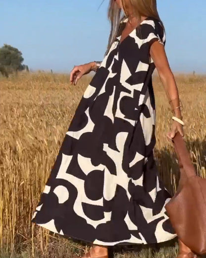 Vestido amplio con estampado gráfico y escote en V para mujer – MAËRYS