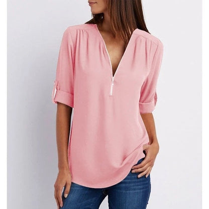 Top relajado con diseño moderno y media cremallera para mujer – LYSANDRA