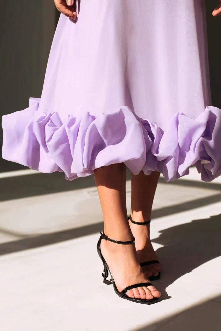 Vestido largo con volantes y escote en V – Alvéria