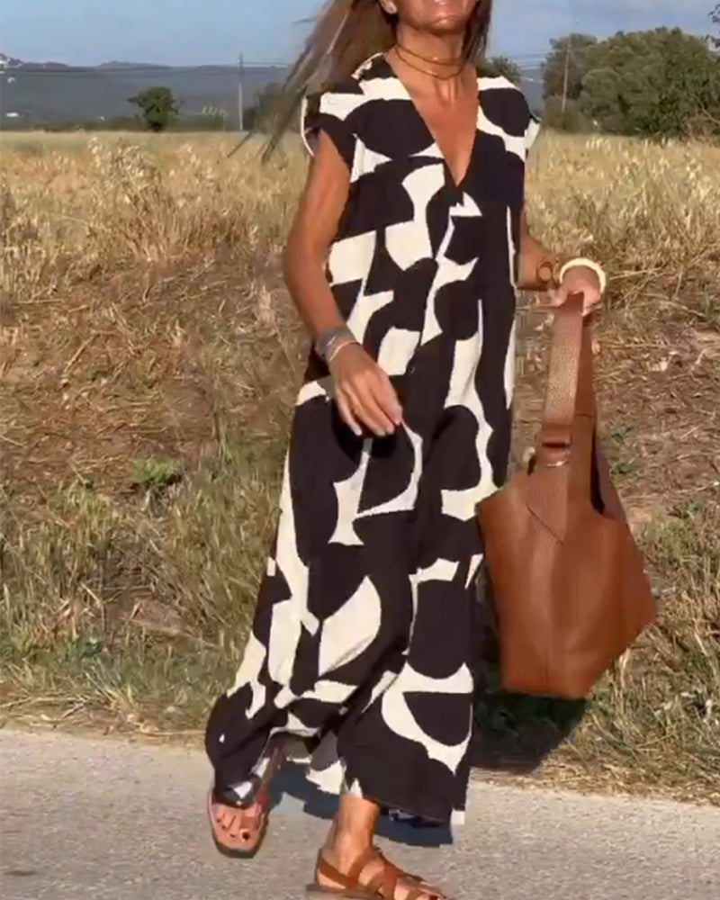 Vestido estampado con escote en V y corte fluido – STEPHARA