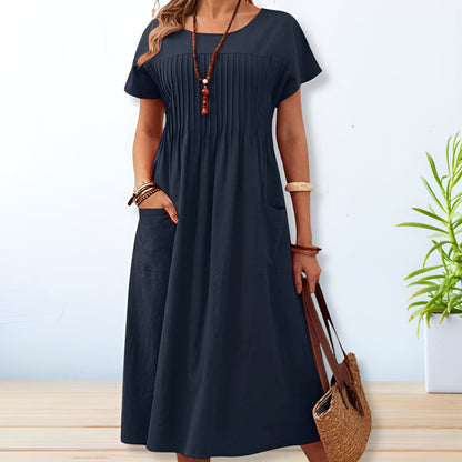 Vestido midi con corte relajado, detalle plisado y bolsillos – SERENA